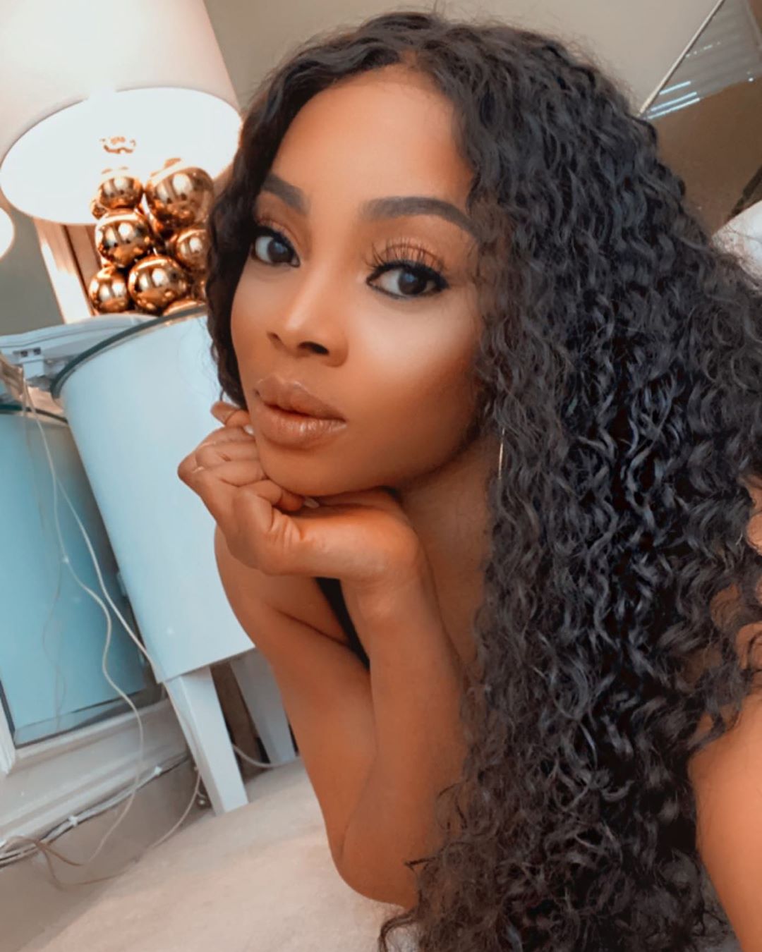 Toke Makinwa posts photo-shopped nu9de photos of herself to avoid blackmail