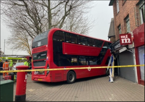 Several injured’ as double decker bus crashes into shop in London rush hour (photos)