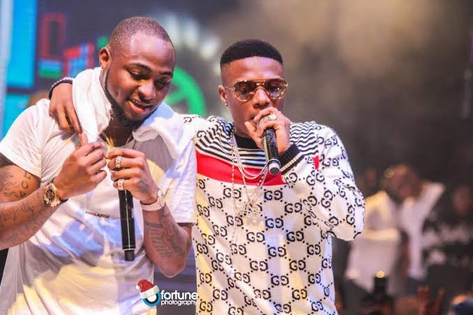 Wizkid And Davido Spotted In Quilox Club, Lagos, Hugging Each Other Tightly