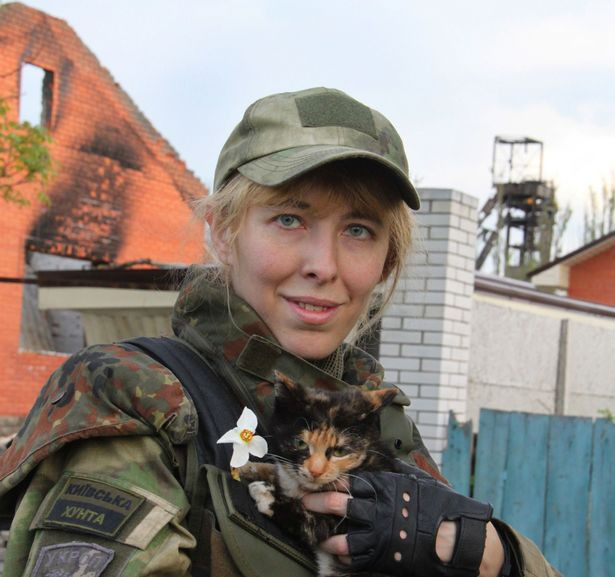 Ukraine's deadliest female sniper who killed 3 Russians in a night vows to take on Putin if he orders Russian troops to invade