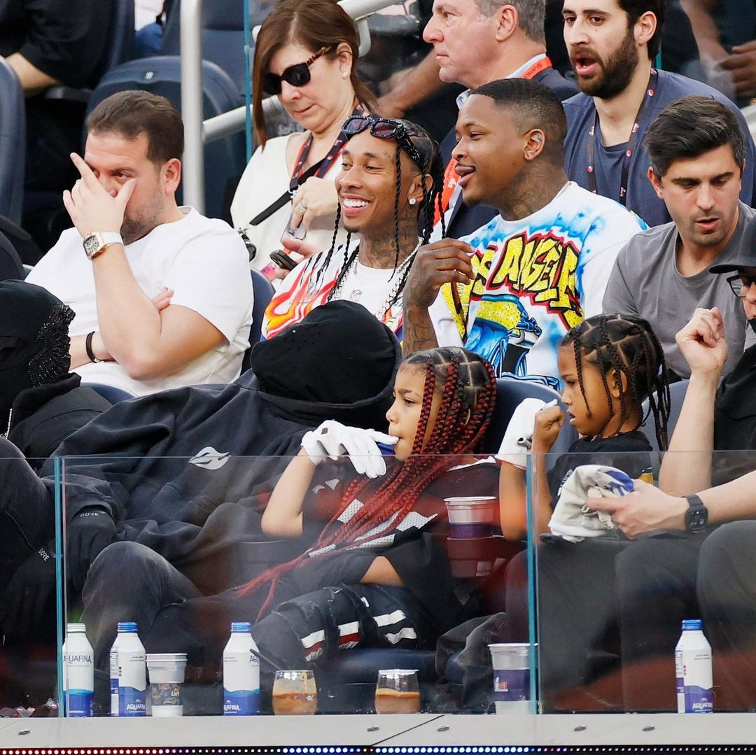 Kanye West seen at the Super Bowl with his two eldest kids (photos/video)