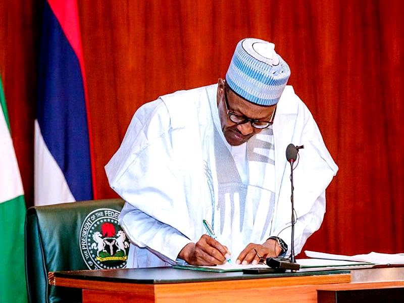 Buhari finally signs electoral act bill into law