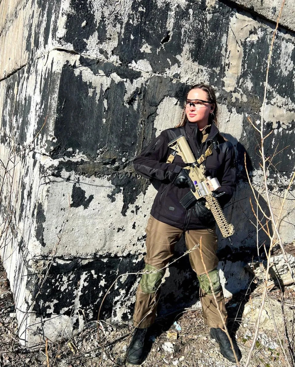 Former Miss Ukraine takes up gun to fight against Russia's invasion (photos)