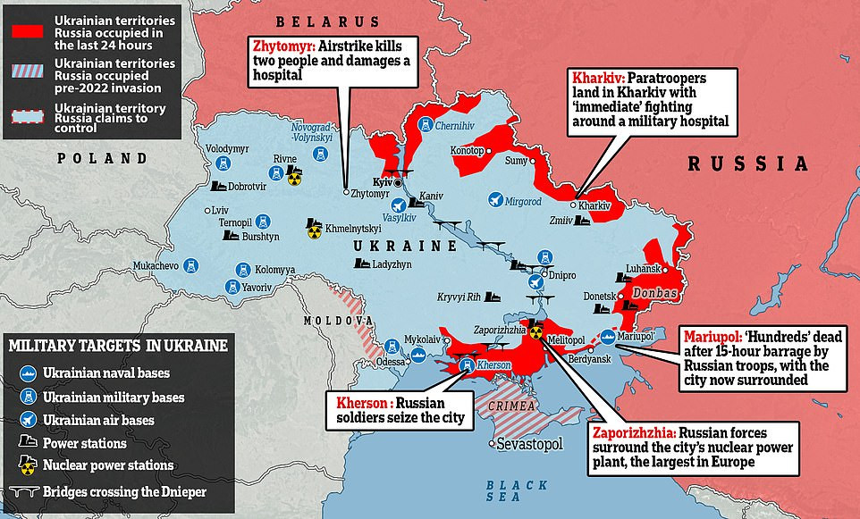 First major Ukranian city falls to Russian forces as city Mayor tells residents to obey Putin's soldiers and begs troops not to shoot civilians