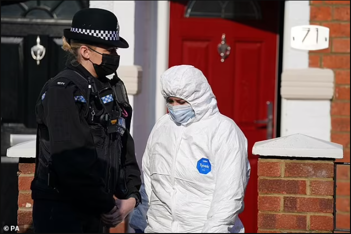 Primary school teacher charged with murder after body of missing man was found in the garden of her house