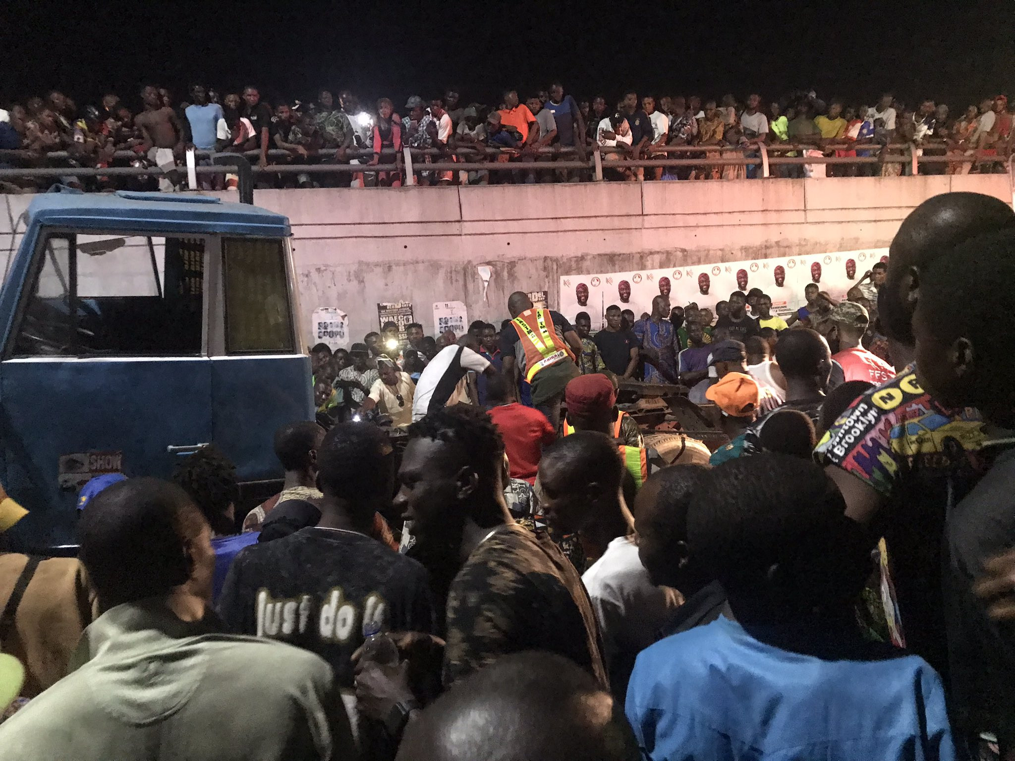 Many feared dead as trailer falls from bridge and lands on a car in Ojuelegba
