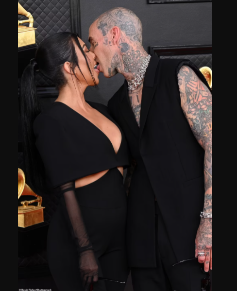 Grammys 2022: Kourtney Kardashian tongue-kisses Travis Barker on the red carpet as they pack on the PDA (photos)