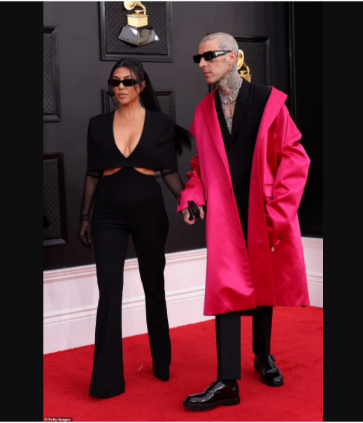 Grammys 2022: Kourtney Kardashian tongue-kisses Travis Barker on the red carpet as they pack on the PDA (photos)