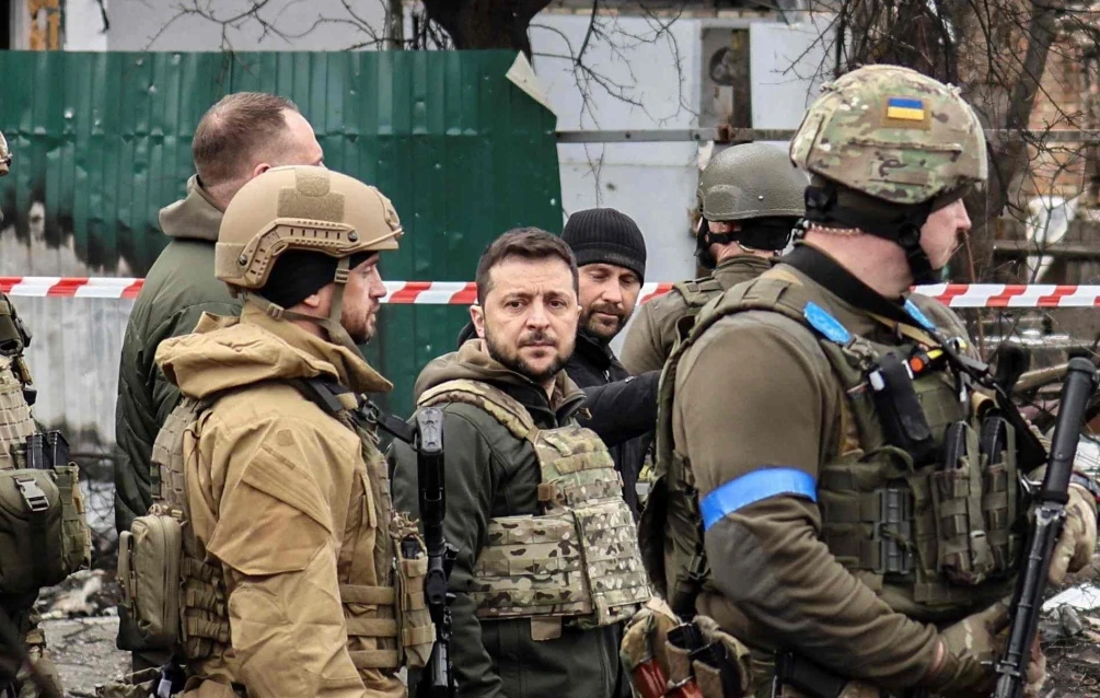 Genocide' - Ukraine's President Zelensky fights back tears as he visits site of mass burial graves allegedly dug by Russian soldiers (photo/video)