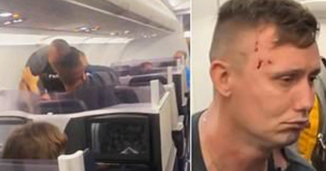 Shocking moment Mike Tyson loses his cool and punches plane passenger for being 'over-zealous' (video)