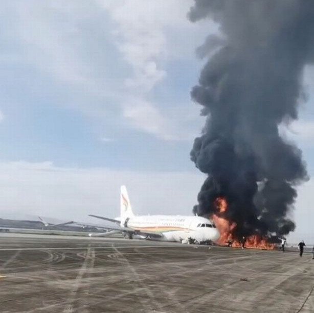 Plane carrying 122 passengers bursts into flames on runway during take-off