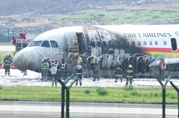 Plane carrying 122 passengers bursts into flames on runway during take-off