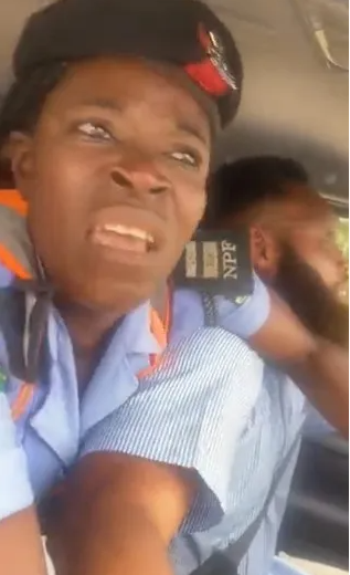 Help me" Policewoman cries out as a driver zooms off with her in his car after she entered 'without permission' (video)