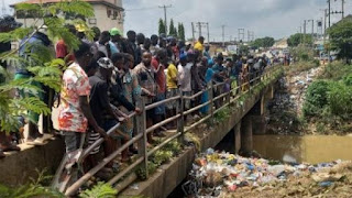 SAD!!! Woman’s headless butchered remains dumped near Abuja river(Photos)
