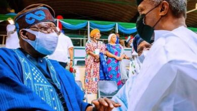 Tinubu shakes hands with Osinbajo as he wins APC presidential primary