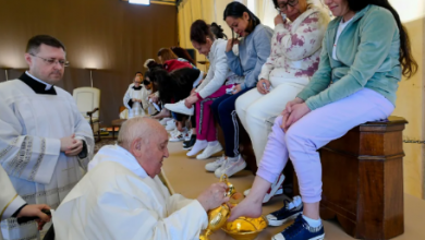 Pope breaks with tradition by washing feet of only women as he celebrates Holy Thursday Mass